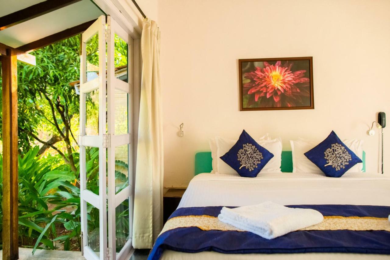 Aquatica Resorts & Spa Morjim Bagian luar foto